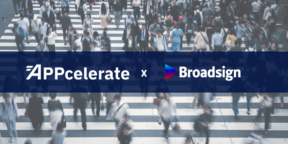 APPcelerate and Broadsign logos over a blurred image of pedestrians crossing a busy city street.
