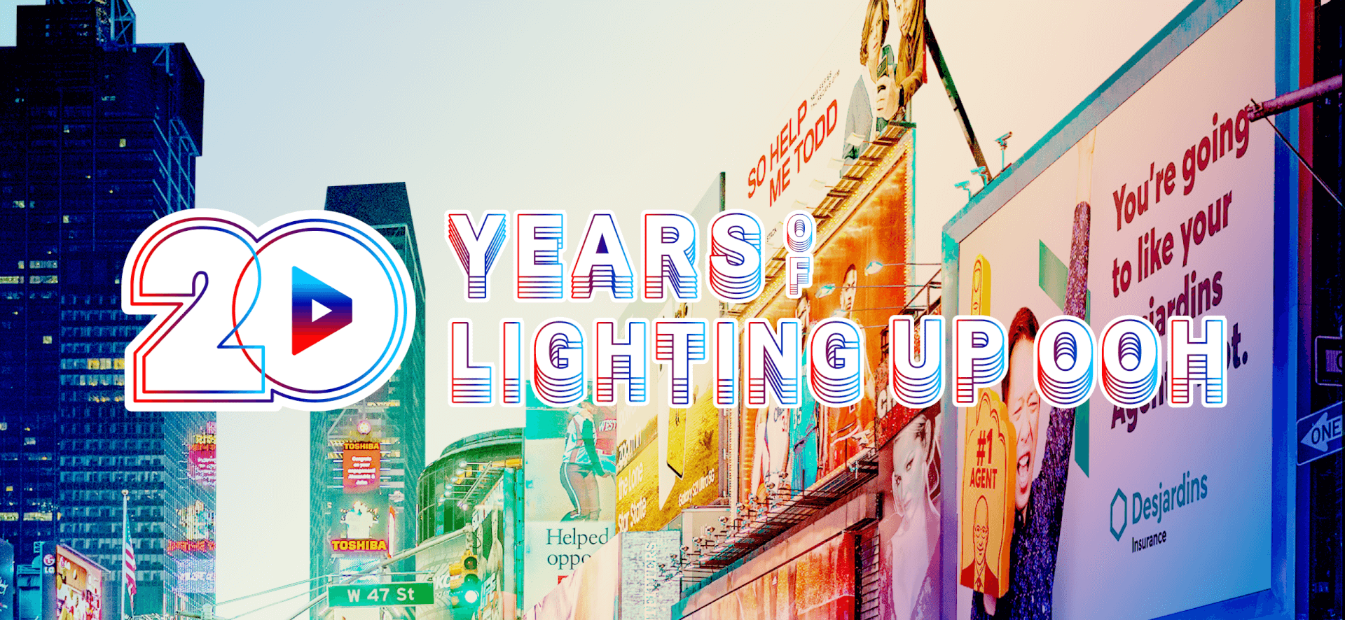 Digital billboard in Times Square featuring the text “20 Years Lighting Up OOH.”