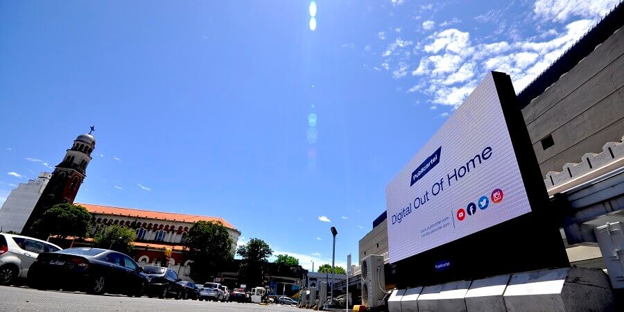 A Publicartel display standing by the side of the road