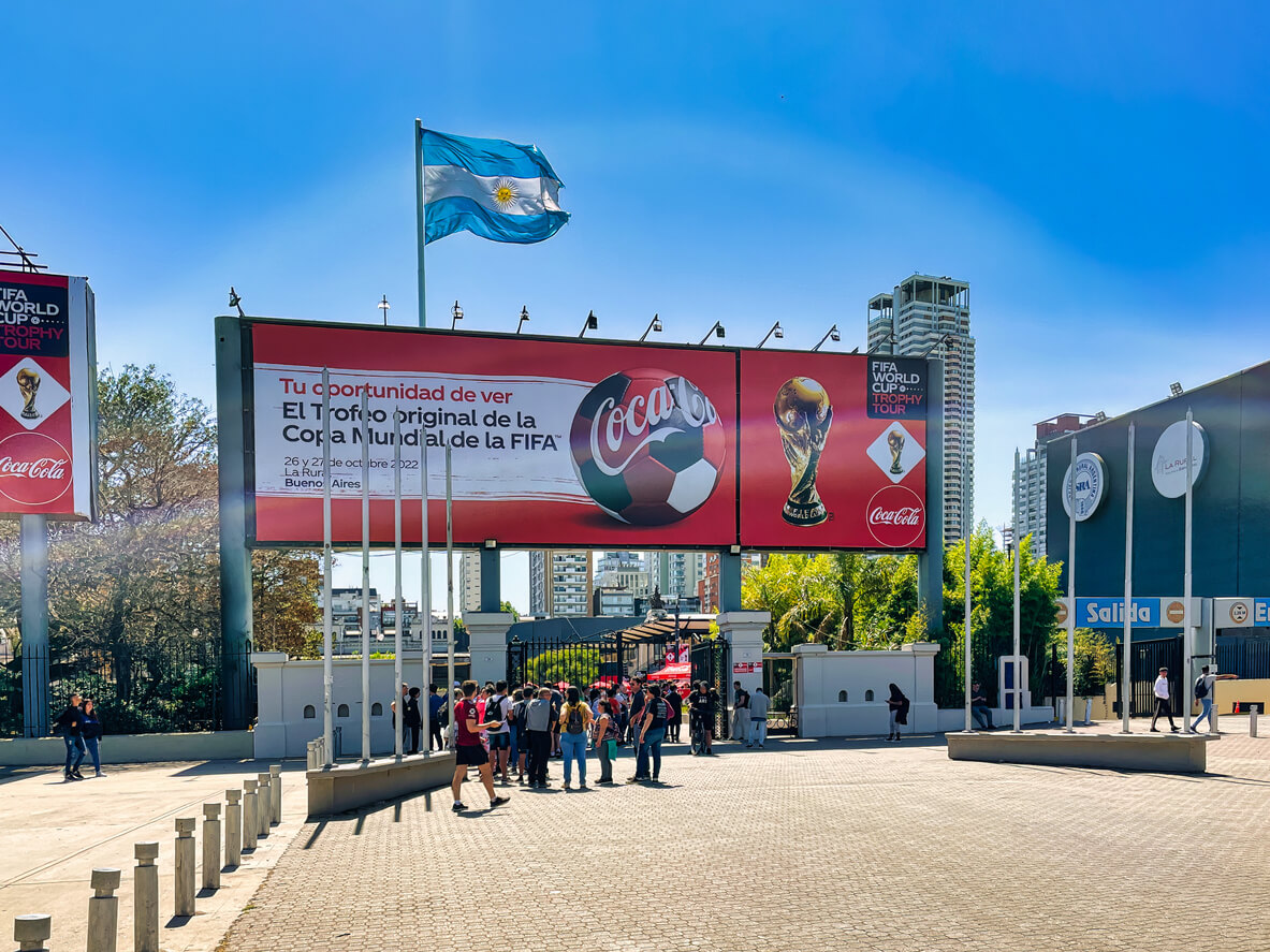 Coca-Cola billboard promoting the FIFA World Cup Trophy Tour outside a venue in Buenos Aires, Argentina.